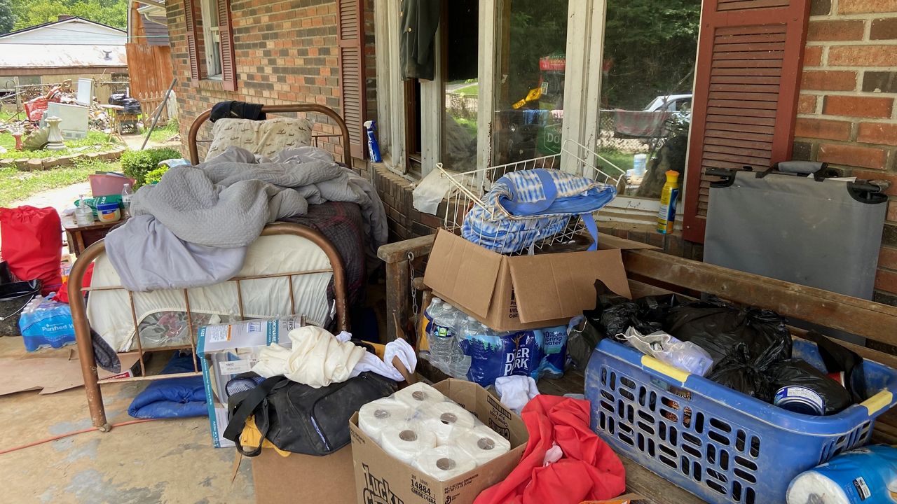Orby Campbell, a flood victim in Hazard has been sleeping on his porch since flooding damaged his home, his daughter said. (Spectrum News 1/Erin Kelly)