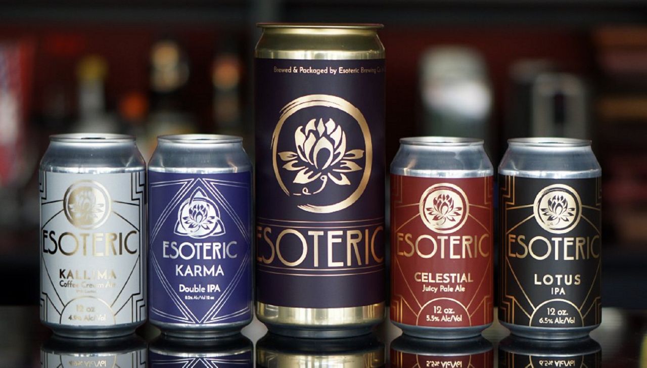 Cans of beer brewed by Walnut Hills-based brewery Esoteric Brewing (Provided)