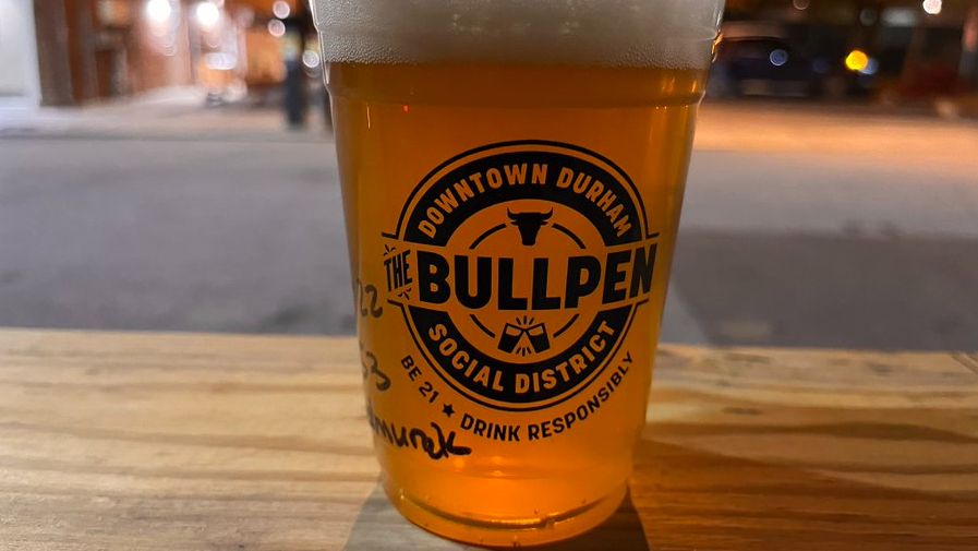 Downtown Durham's new social district, called "The Bullpen," allows people to take drinks to go from bars and restaurants. (Spectrum News 1/Charles Duncan)