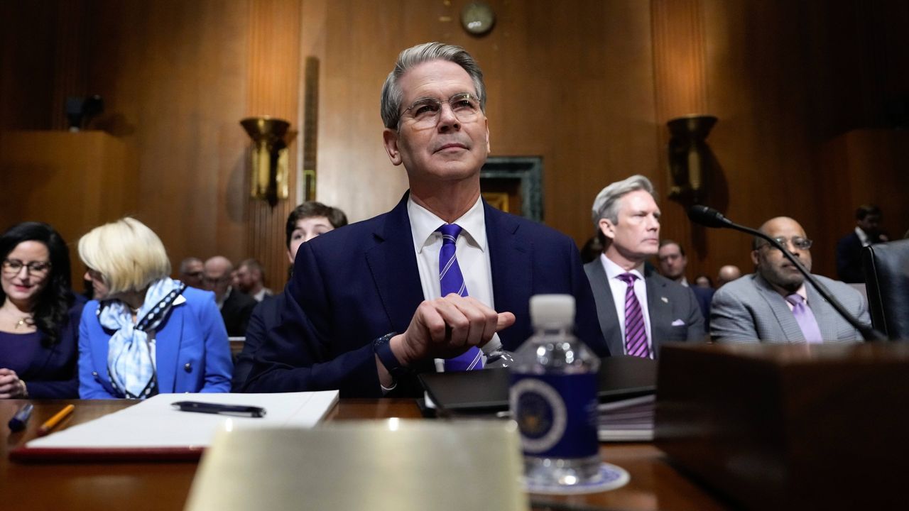 Scott Bessent, President-elect Donald Trump's choice to be Secretary of the Treasury, appears before the Senate Finance Committee for his confirmation hearing, at the Capitol in Washington, Thursday, Jan. 16, 2025. (AP Photo/Ben Curtis)