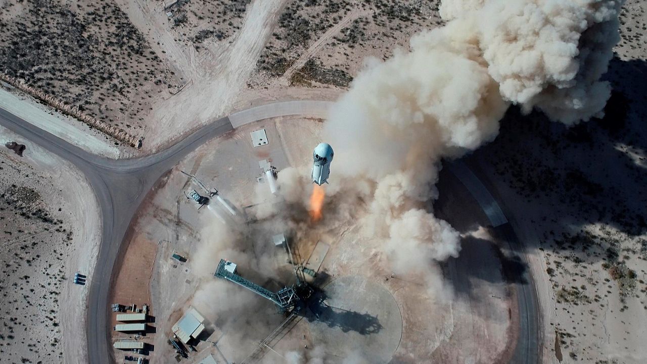 The New Shepard NS-14 rocket lifts off from Launch Site One in West Texas in Jan. 2021. (Blue Origin via AP)