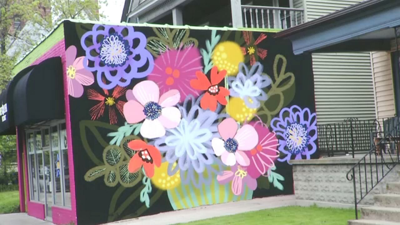 New Mural on Elmwood Avenue Celebrates Multiple Milestones