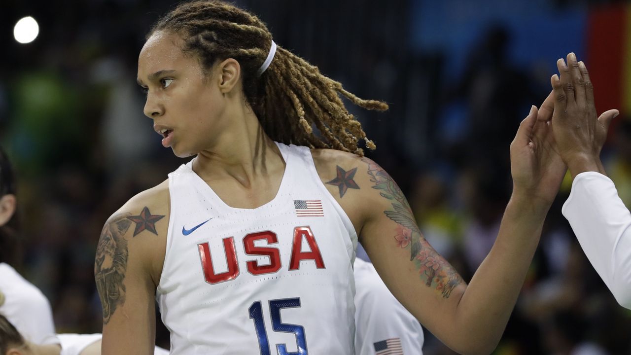 United States center Brittney Griner high fives teammates after a play during the second half of a women's basketball game against Senegal at the Youth Center at the 2016 Summer Olympics in Rio de Janeiro, Brazil, Sunday, Aug. 7, 2016. The United States defeated Senegal 121-56. (AP Photo/Carlos Osorio)