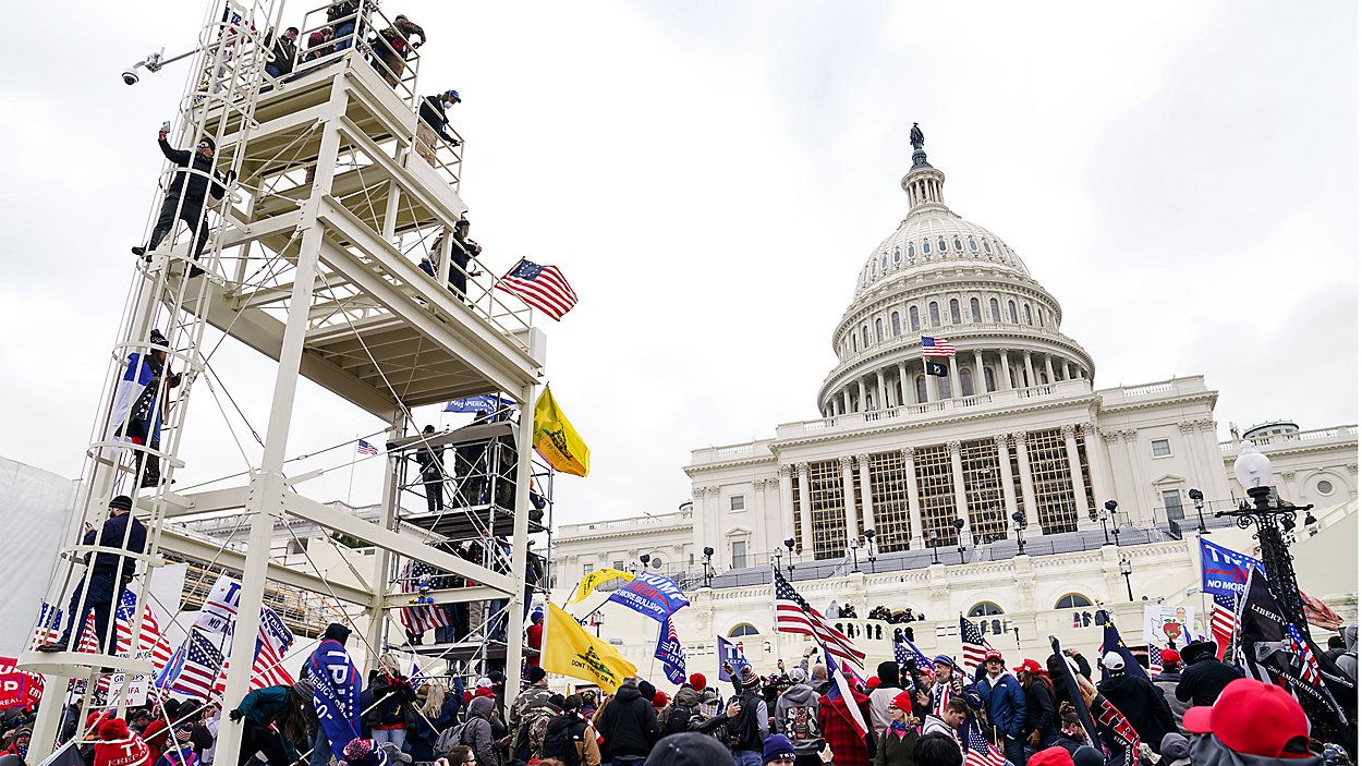 A large pro-Trump crowd surrounds the U.S. Capitol. (Associated Press)