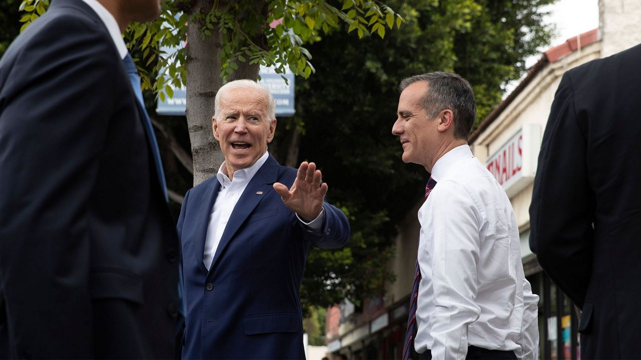 Joe Biden walking with Mayor Eric Garcetti