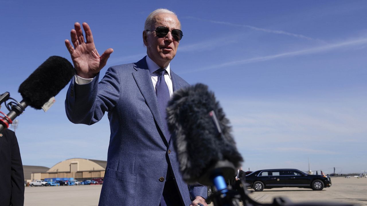 President Joe Biden talks to reporters before boarding Air Force One, Tuesday, April 11, 2023, at Andrews Air Force Base, Md. (AP Photo/Patrick Semansky)