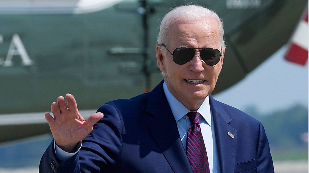 President Joe Biden waves as he walks to board Air Force One at Andrews Air Force Base on Friday, July 28, 2023.