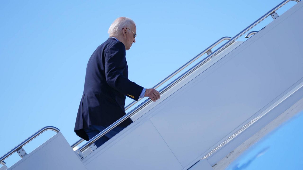 President Joe Biden boards Air Force One to depart at Dane County Regional Airport in Madison, Wis., following a campaign visit, Friday, July 5, 2024. (AP Photo/Manuel Balce Ceneta)