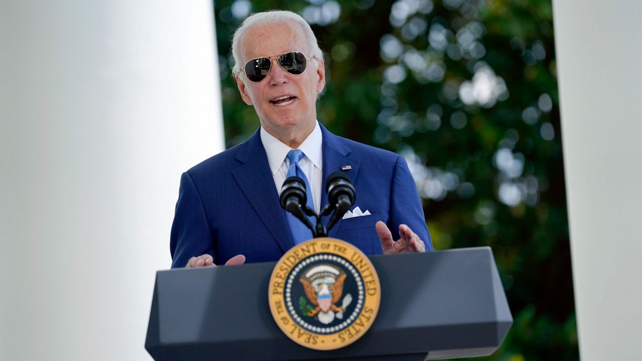 President Joe Biden speaks at the White House on Friday before signing two bills aimed at combating fraud in COVID-19 small business relief programs. (AP Photo/Evan Vucci, Pool)