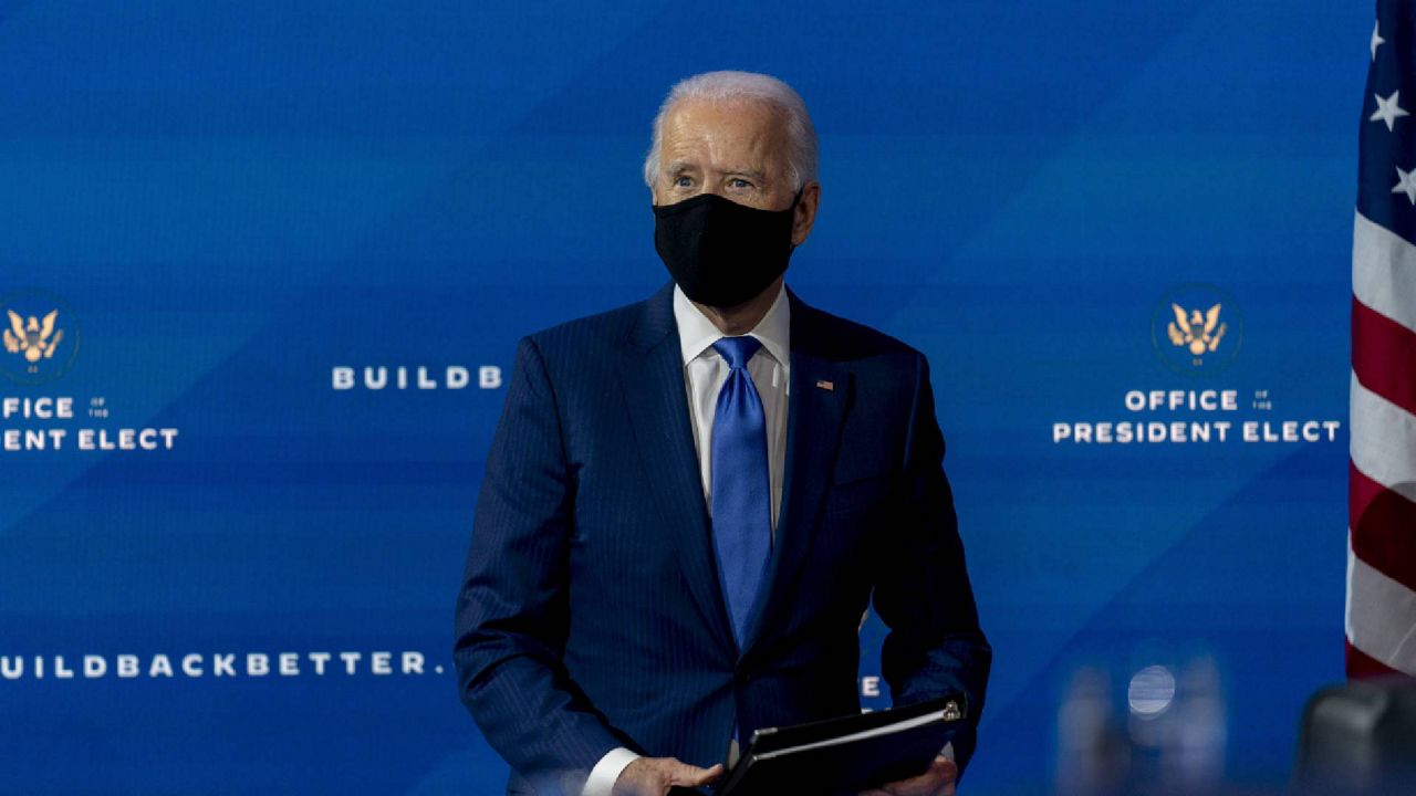 President-elect Joe Biden departs a news conference Tuesday. (AP Photo/Andrew Harnik)
