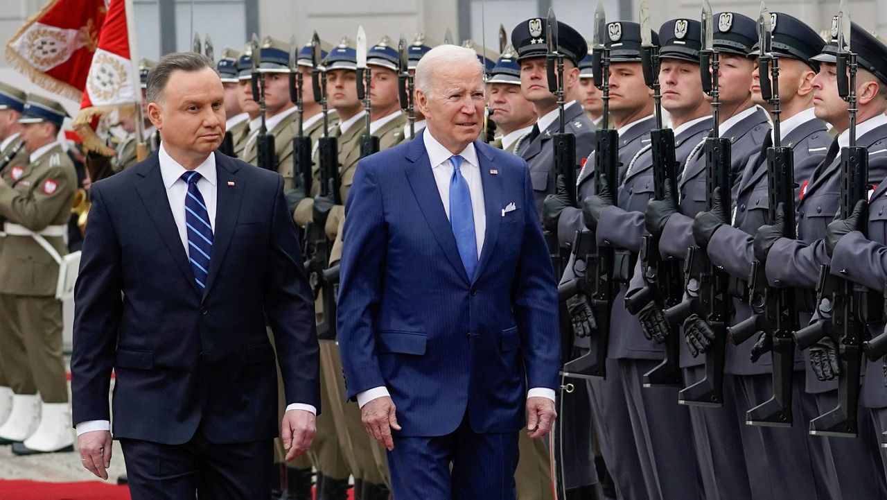 President Joe Biden walks across the South Lawn of the White House in Washington, Wednesday, Feb 22, 2023, after returning from his trip to Ukraine and Poland. (AP Photo/Susan Walsh)