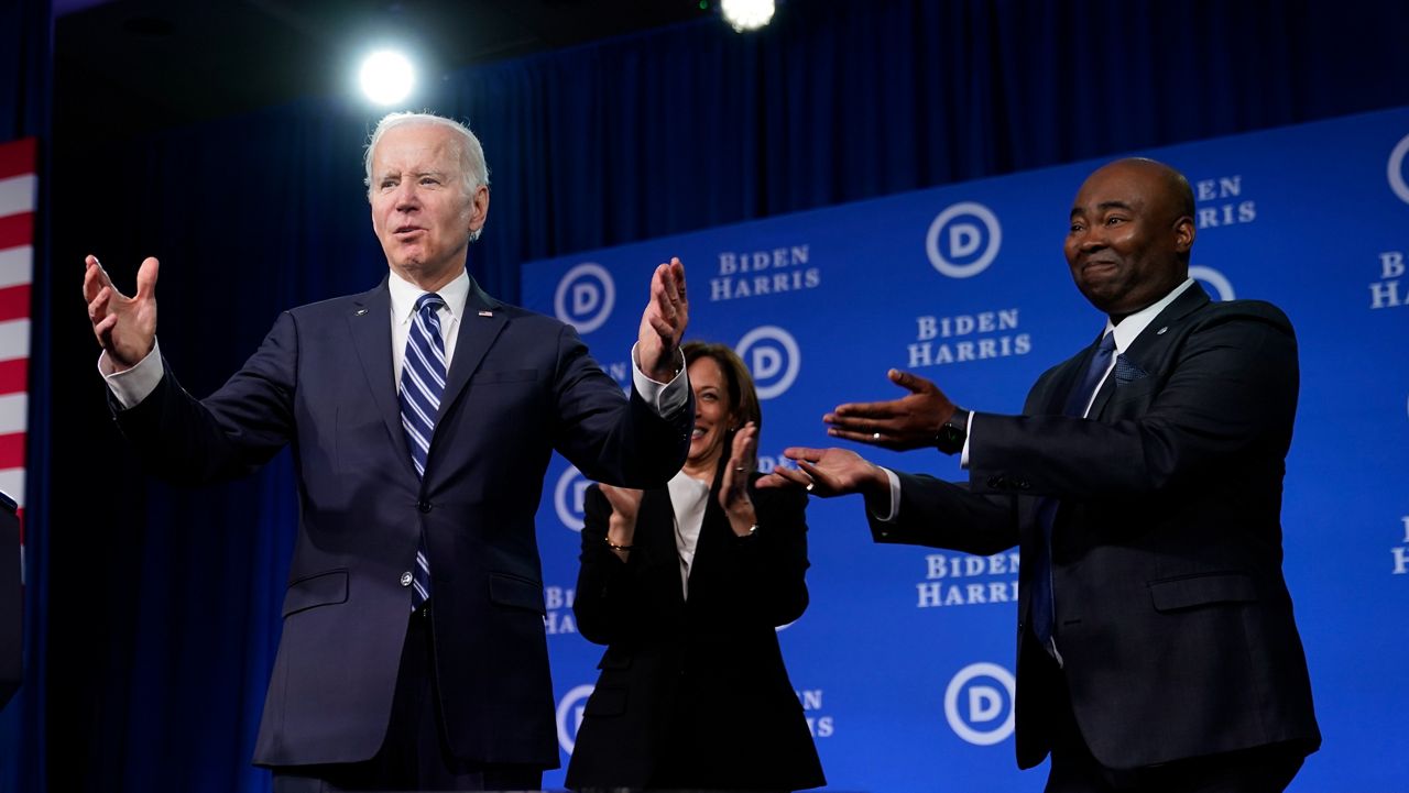 President Joe Biden and Vice President Kamala Harris stand on stage with Democratic National Committee chairman Jaime Harrison at the DNC winter meeting on Friday, Feb. 3, 2023, in Philadelphia. (AP Photo/Patrick Semansky)