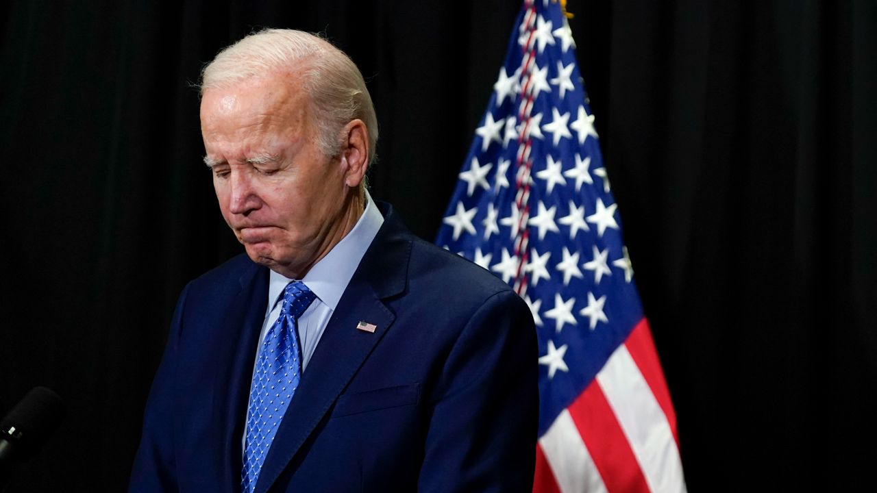 President Joe Biden pauses as he speaks to reporters Sunday, Nov. 26, 2023, about hostages freed by Hamas in a third set of releases under a four-day cease-fire deal between Israel and Hamas. (AP Photo/Stephanie Scarbrough)