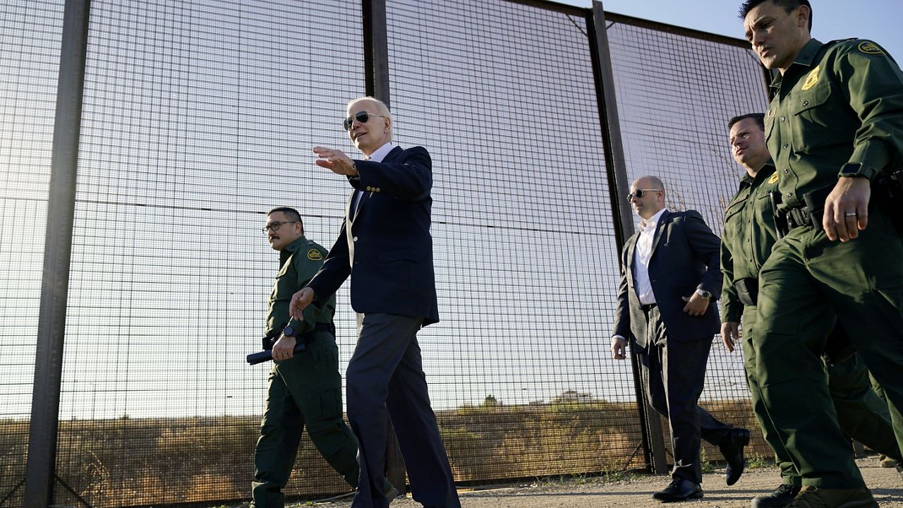 President Joe Biden walks along a stretch of the U.S.-Mexico border in El Paso, Texas, on Jan. 8. (AP Photo/Andrew Harnik, File)
