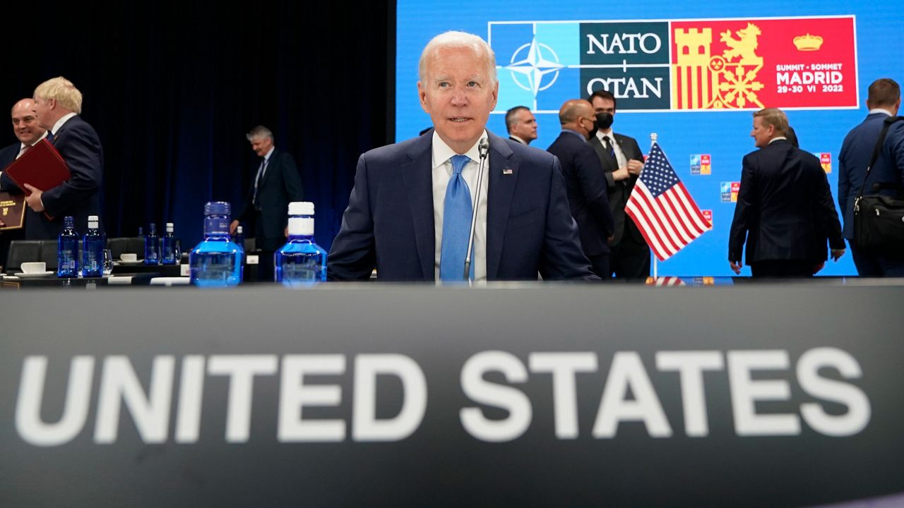President Joe Biden waits Wednesday for the start of a roundtable meeting at the NATO summit in Madrid. (AP Photo/Susan Walsh, Pool)