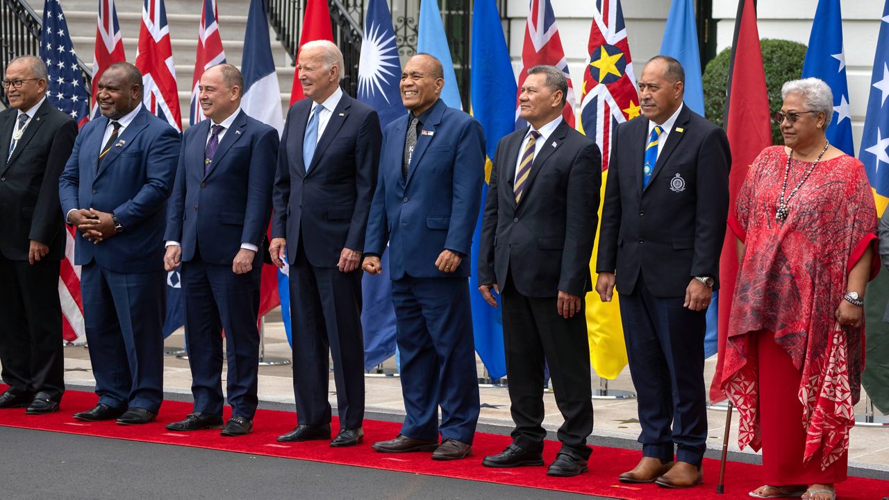 President Joe Biden, fourth from left, stands with Pacific Islands Forum leaders as they pose for a group photo at the White House in Washington, Monday, Sept. 25, 2023. (AP Photo/Mark Schiefelbein)