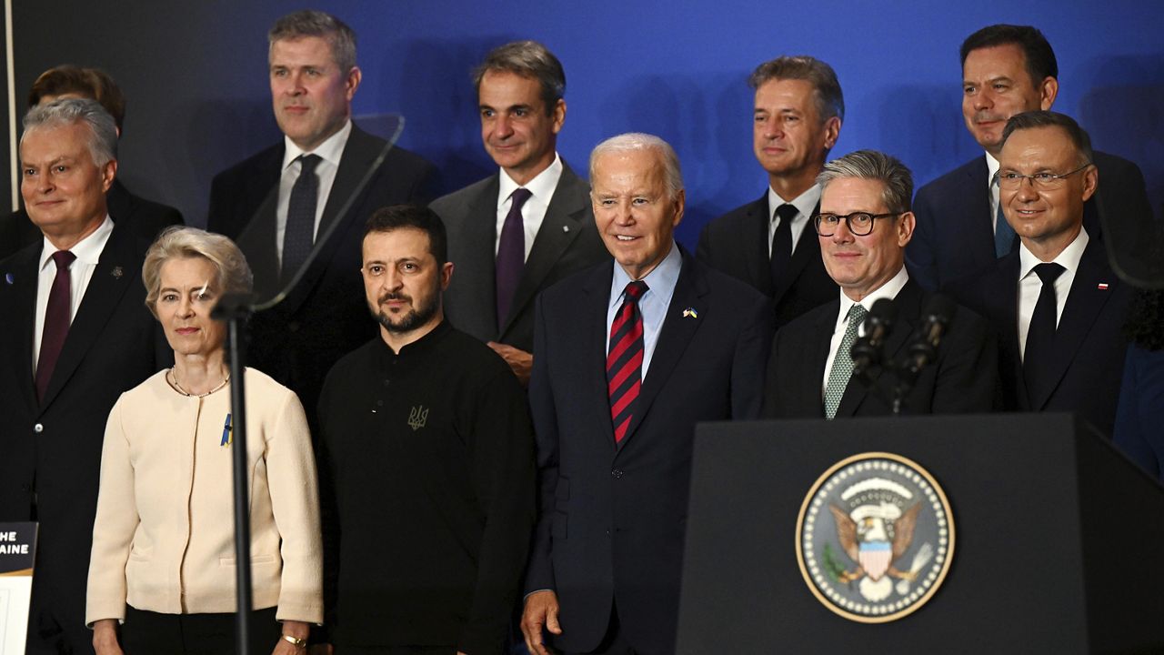 U.S. President Joe Biden, center, with Ukraine's President Volodymyr Zelenskyy, front second left, President of the European Commission Ursula von der Leyen, front left, Britain's Prime Minister Keir Starmer, front second right, and other world leaders pose for a family picture of the launching of a Joint Declaration of Support for Ukrainian Recovery and Reconstruction, Wednesday, Sept. 25, 2024, in New York. (Leon Neal/Pool Photo via AP)