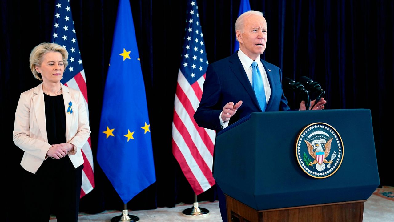 President Joe Biden and European Commission President Ursula von der Leyen talk to the press about the Russian invasion of Ukraine on Friday at the U.S. Mission in Brussels. (AP Photo/Evan Vucci)