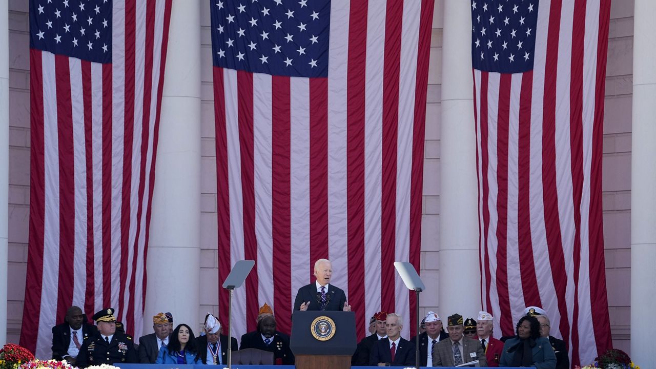 President Joe Biden speaks at the National Veterans Day Observance at the Memorial Amphitheater at Arlington National Cemetery in Arlington, Va., Saturday, Nov. 11, 2023. (AP Photo/Andrew Harnik)