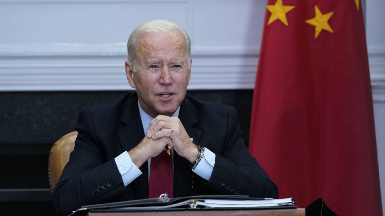 FILE - President Joe Biden speaks as he meets virtually with Chinese President Xi Jinping from the Roosevelt Room of the White House in Washington, Nov. 15, 2021. (AP Photo/Susan Walsh, File)