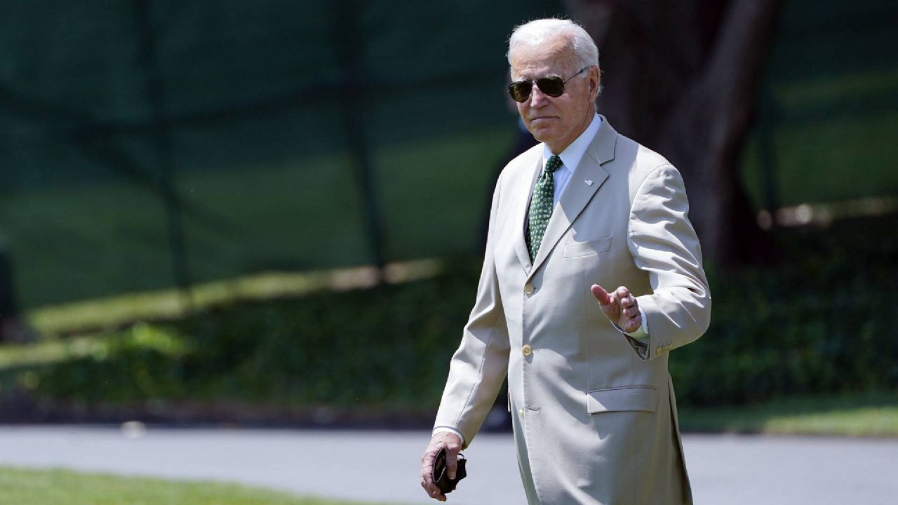 President Joe Biden waves as he walks to Marine One on the South Lawn of the White House in Washington, Friday, Aug. 6, 2021, as he heads to Wilmington, Del., for the weekend. (AP Photo/Susan Walsh)