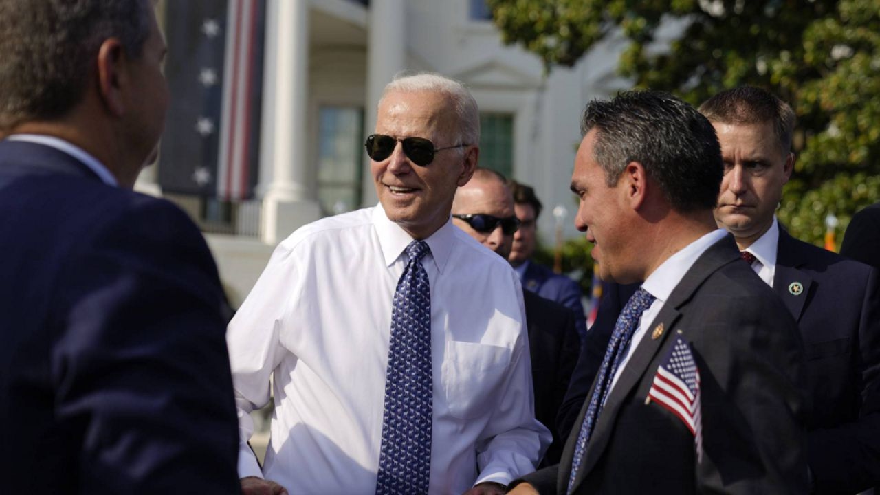 Biden President Joe Biden greets people after speaking about the Inflation Reduction Act of 2022 during a ceremony on the South Lawn of the White House in Washington, Tuesday, Sept. 13, 2022. (AP Photo/Andrew Harnik)