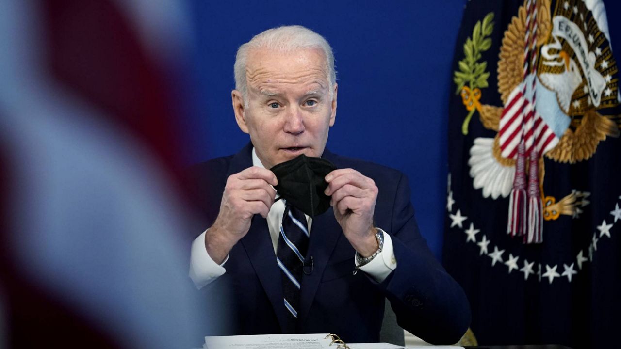 President Joe Biden speaks about the government's COVID-19 response, in the South Court Auditorium in the Eisenhower Executive Office Building on the White House Campus in Washington, Thursday, Jan. 13, 2022. (AP Photo/Andrew Harnik)