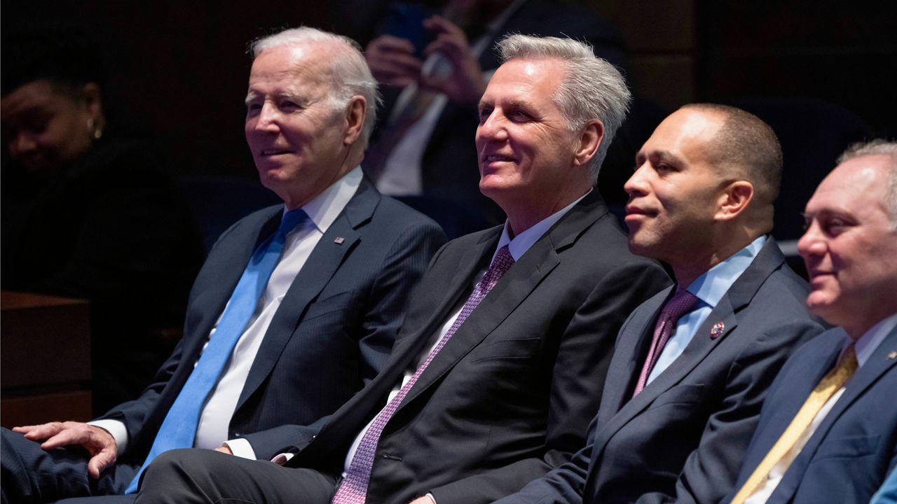 From left, President Joe Biden, Speaker of the House Kevin McCarthy of Calif., House Minority Leader Hakeem Jeffries of N.Y., and House Majority Leader Steve Scalise, R-La., listen during a sermon as they sit together at the National Prayer Breakfast, at the Capitol in Washington, Thursday, Feb. 2, 2023. (AP Photo/J. Scott Applewhite)