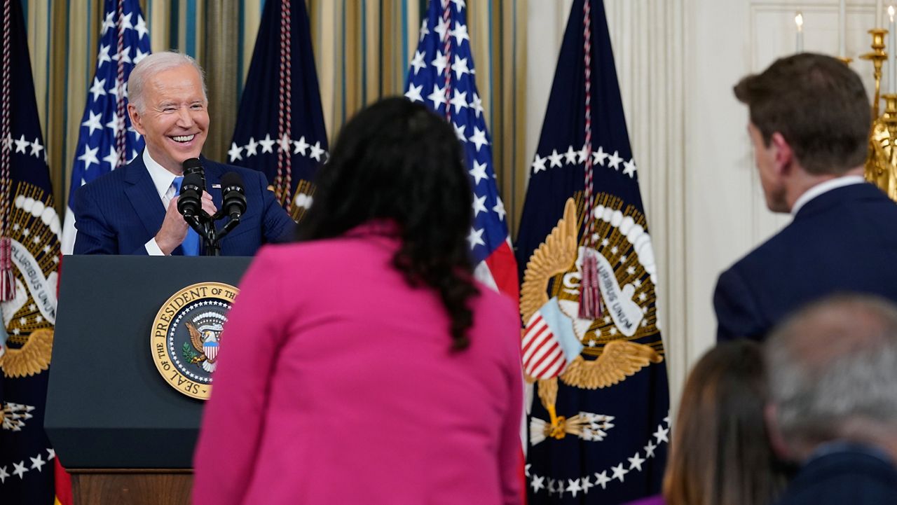 President Joe Biden smiles as he listens to questions from reporters in the State Dining Room of the White House in Washington, Wednesday, Nov. 9, 2022. (AP Photo/Susan Walsh)