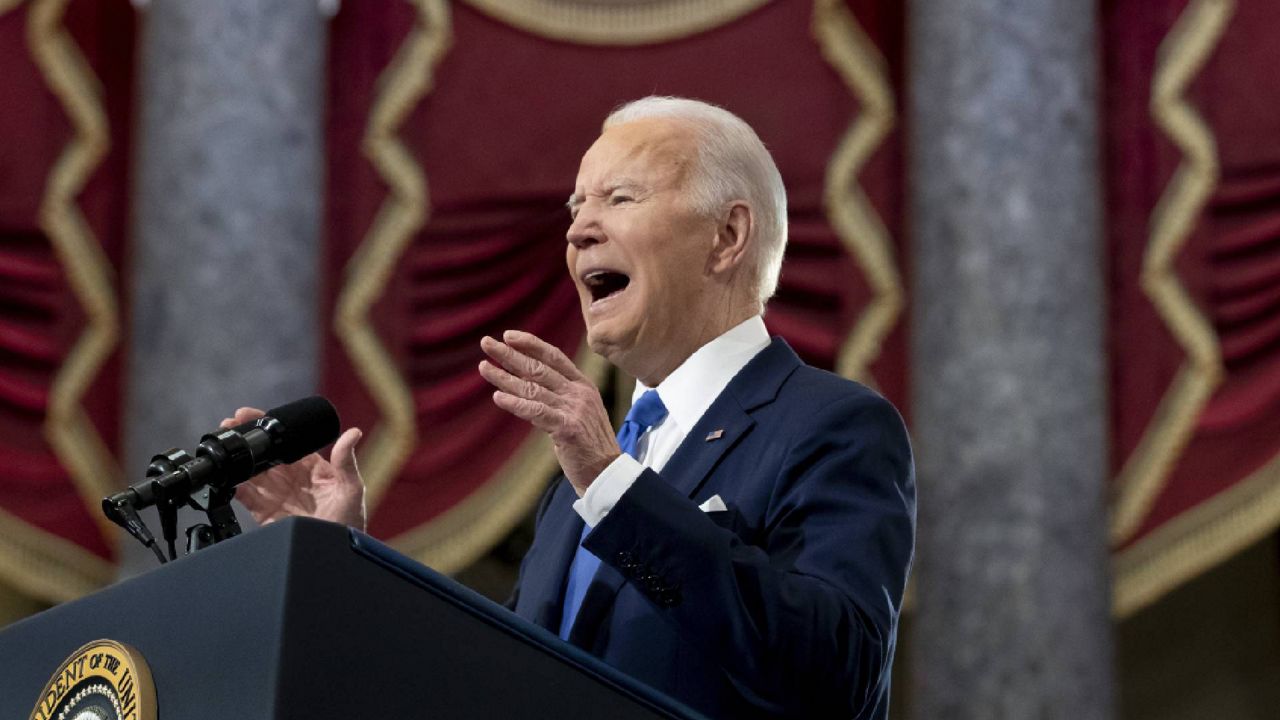 President Joe Biden speaks from Statuary Hall at the U.S. Capitol to mark the one year anniversary of the Jan. 6 riot at the U.S. Capitol by supporters loyal to then-President Donald Trump, Thursday, Jan. 6, 2022, in Washington. (Michael Reynolds/Pool via AP)