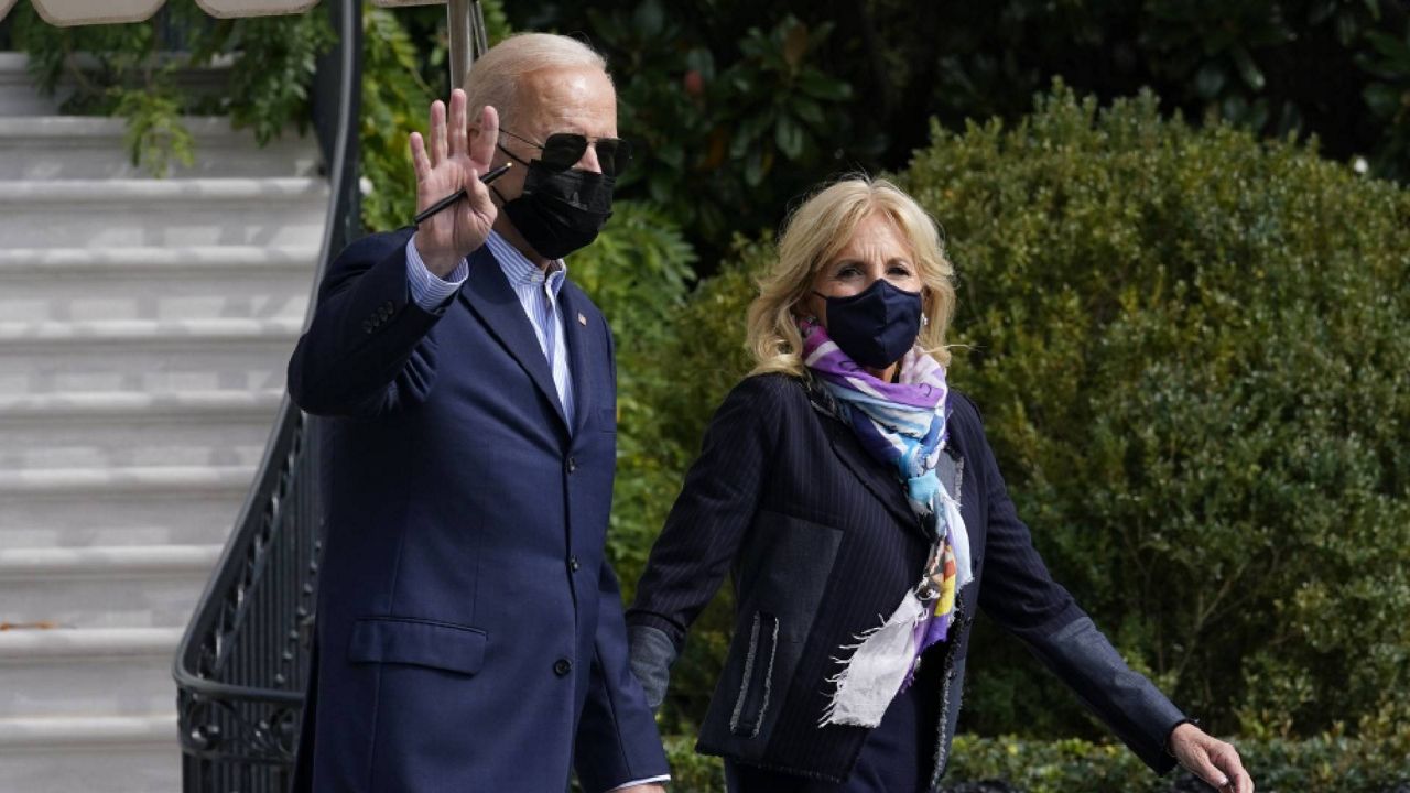 President Joe Biden and first lady Jill Biden walk out of the White House on the South Lawn, and head to Marine One, Thursday, Oct. 28, 2021, as the Biden's head to Rome, the first leg of a second major foreign trip. (AP Photo/Susan Walsh)
