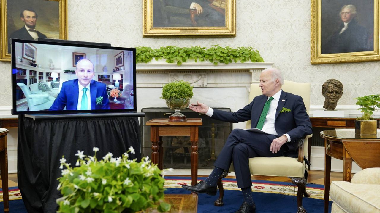 President Joe Biden meets virtually with Irish Prime Minister Micheál Martin in the Oval Office of the White House, Thursday, March 17, 2022, in Washington. Martin tested positive for COVID-19 Wednesday. (AP Photo/Patrick Semansky)