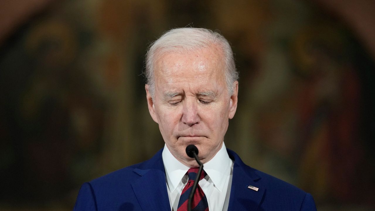 President Joe Biden pauses for a moment of silence as he speaks during an event in Washington, Wednesday, Dec. 7, 2022, with survivors and families impacted by gun violence for the 10th Annual National Vigil for All Victims of Gun Violence. (AP Photo/Susan Walsh)