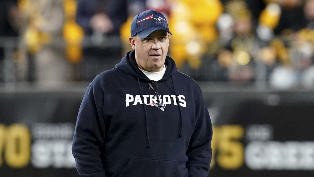 New England Patriots offensive coordinator Bill O'Brien watches warmups for the team's NFL football game against the Pittsburgh Steelers on Dec. 7, 2023, in Pittsburgh. (AP Photo/Matt Freed, File)