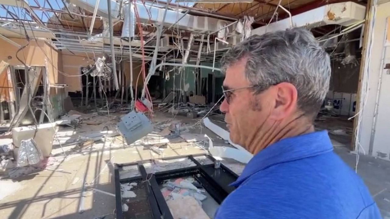 Bill Veach, a Fort Myers Beach resident and town councilman, shows the damages still left behind after Hurricane Ian devastated the southwest Florida region last September. (Spectrum News)