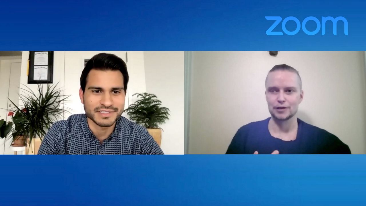 Spectrum News 1 Reporter, Lupe Zapata and co-founder of The Satanic Temple, Lucien Greaves speaking over Zoom ( Lupe Zapata/Spectrum News 1)