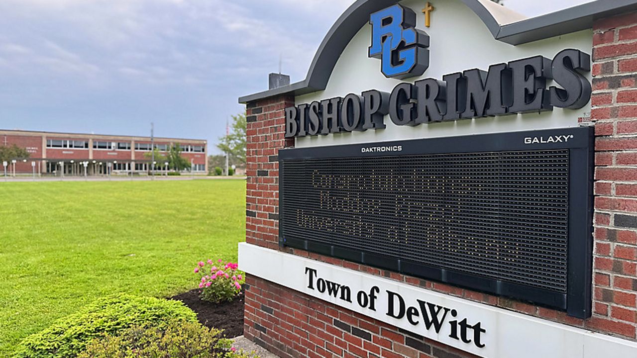 Exterior sign of Bishop Grimes Jr./Sr. High School on the final day of school