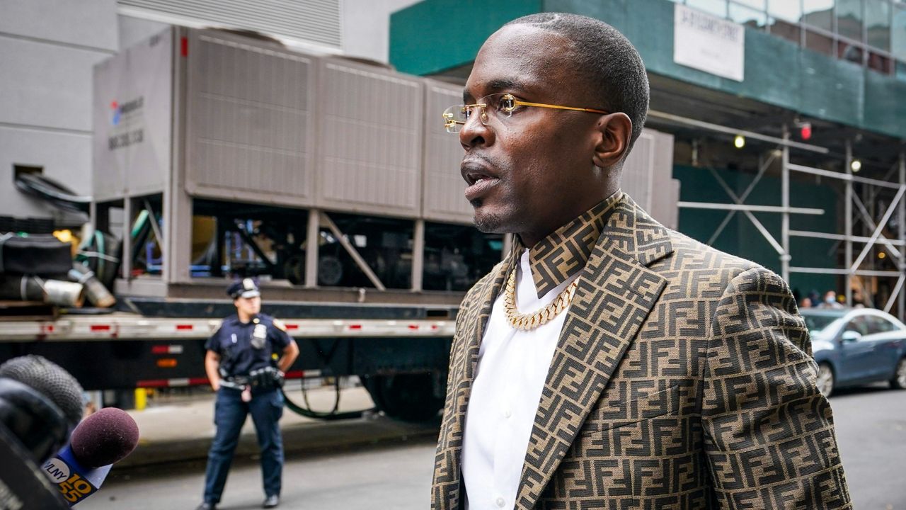 Bishop Lamor Miller-Whitehead speaks with the media about his attempt to negotiate the surrender of a man accused of gunning down a stranger on a New York City subway train, on Tuesday, May 24, 2022, in New York.