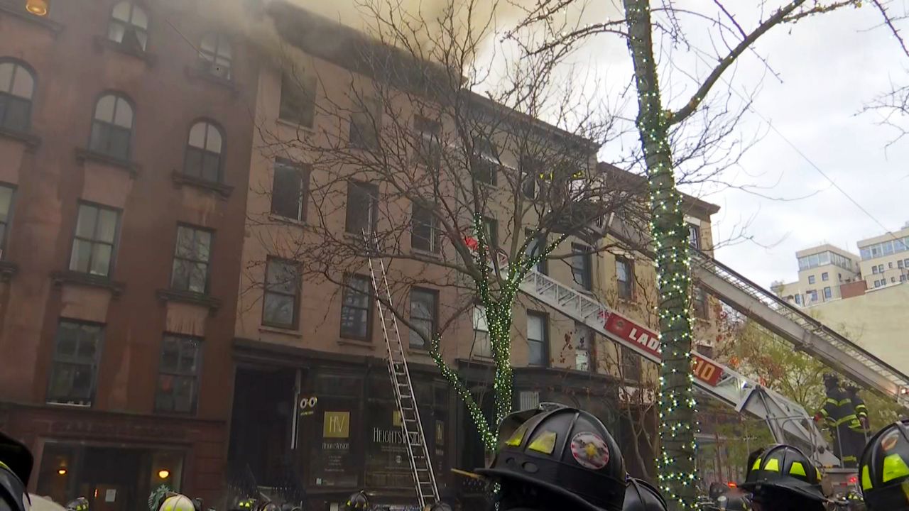 Firefighters try to control fire in Brooklyn Heights