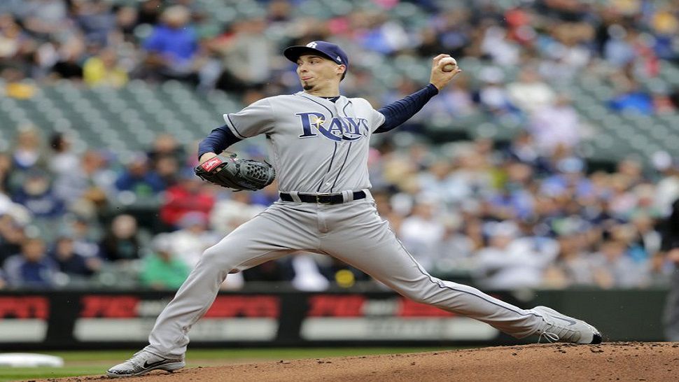 Tampa Bay Rays starting pitcher Blake Snell works against the Seattle Mariners during the first inning of a baseball game on Sunday, June 3, 2018, in Seattle. (AP Photo/John Froschauer)