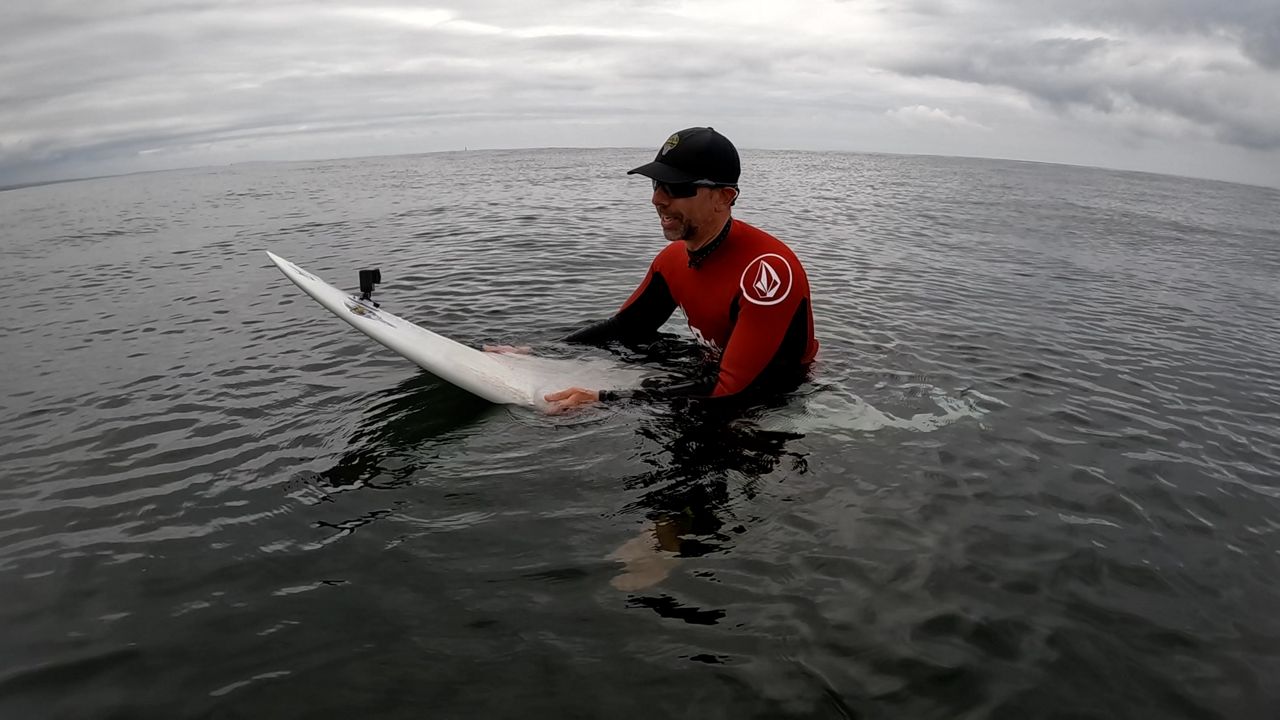 Blind surfer hears and feels waves to catch rides
