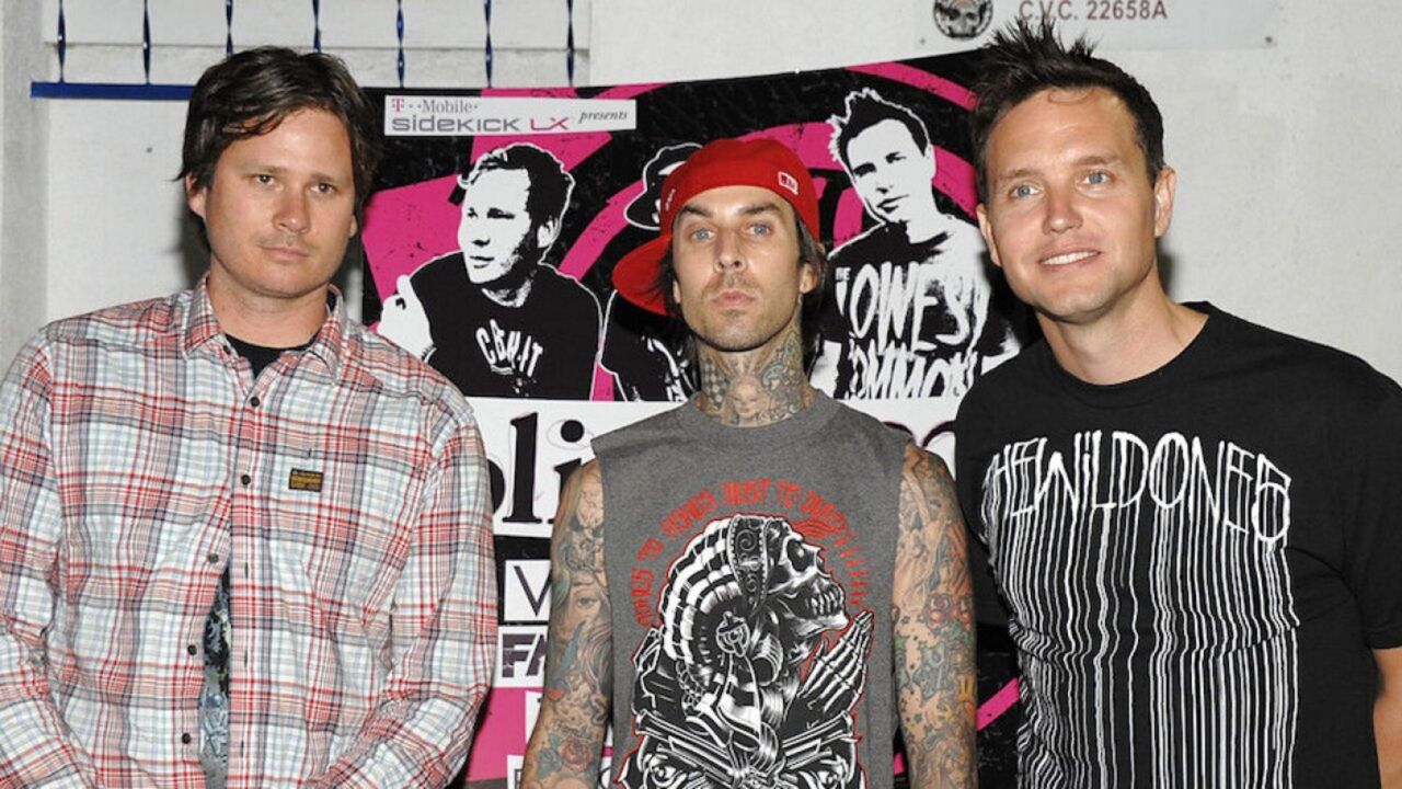 FILE - From left to right, musician Tom DeLonge, drummer Travis Barker, and singer and musician Mark Hoppus of the rock band Blink-182 arrive at the Blink-182 tour launch party in Los Angeles on Monday, May 18, 2009. (AP Photo/Dan Steinberg)