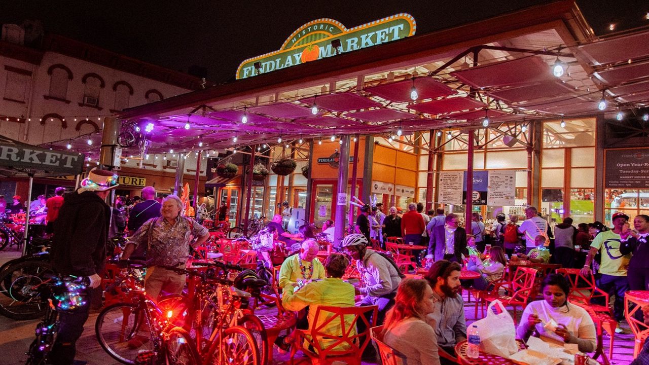 Guests enjoy an outdoor bar area at Findlay Market during BLINK 2022. (Photo courtesy of Findlay Market)