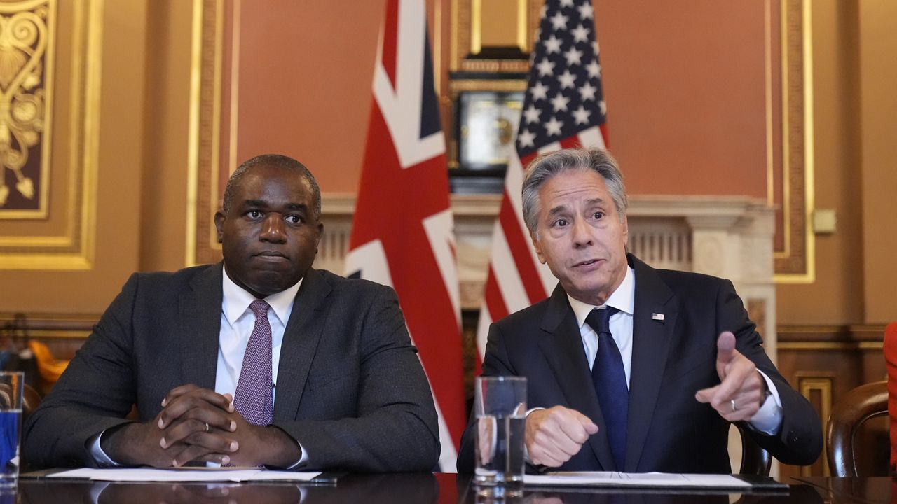 Secretary of State Antony Blinken, right, gestures as he participates with Britain's Foreign Secretary David Lammy, in a strategic dialogue meeting at the Foreign, Commonwealth and Development Office (FCDO) in London, Tuesday, Sept. 10, 2024. (AP Photo/Mark Schiefelbein, Pool)