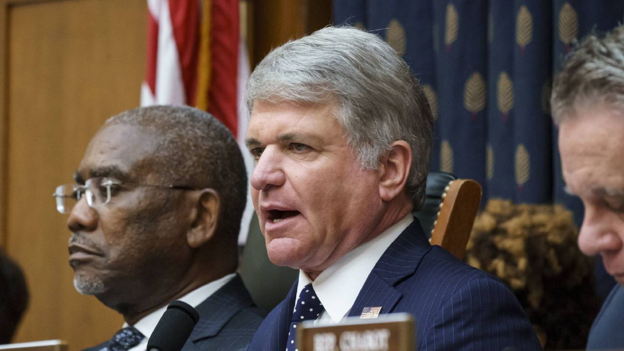 Rep. Michael McCaul, R-Texas, ranking member of the House Foreign Affairs Committee, joined at left by Chairman Gregory Meeks, D-N.Y., discusses the U.S. withdrawal from Afghanistan with Secretary of State Antony Blinken who appeared remotely, at the Capitol in Washington, Monday, Sept. 13, 2021. (AP Photo/J. Scott Applewhite)