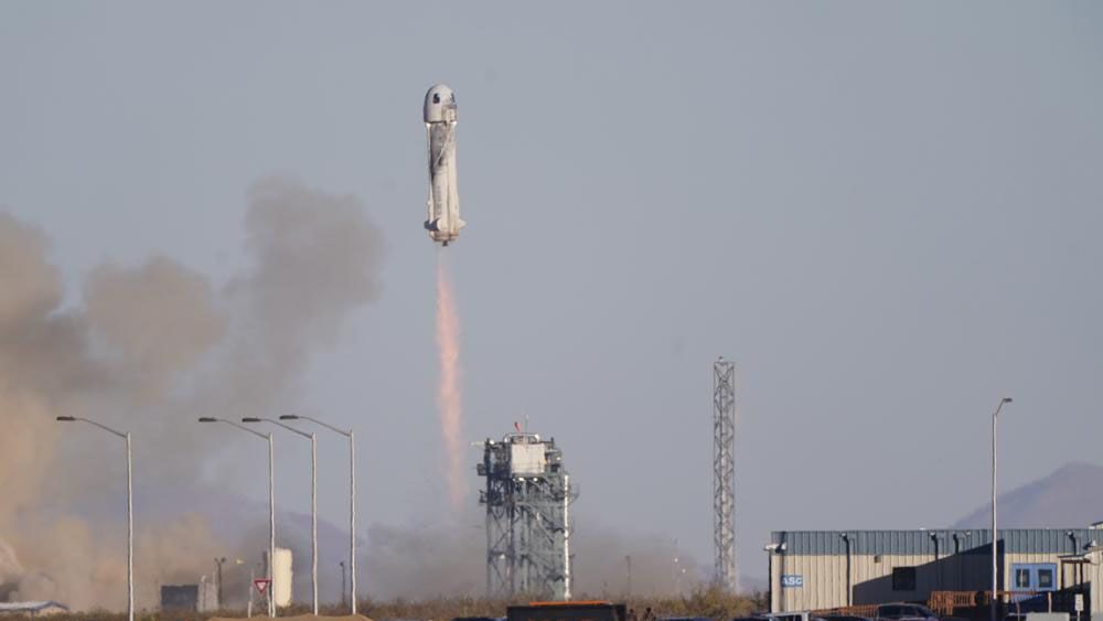 Blue Origin's New Shepard rocket launches carrying TV celebrity and former NFL football great Michael Strahan along with other passengers from its spaceport near Van Horn, Texas, Saturday, Dec. 11, 2021. Joining Strahan on the short space flight are Laura Shepard Churchley, the oldest daughter of America's first astronaut, Alan Shepard, as well as four paying customers. (AP Photo/LM Otero)