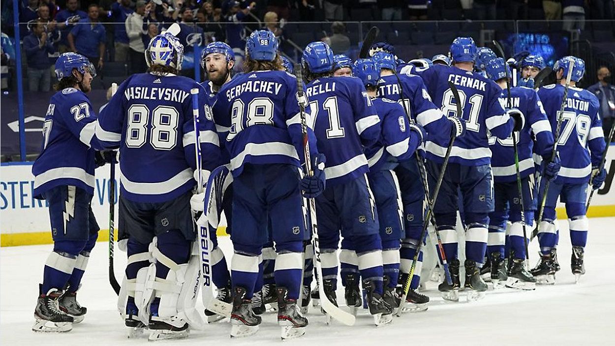 The Tampa Bay Lightning celebrate after eliminating the Florida Panthers in Game 6 of their first-round Stanley Cup Playoff series Wednesday. (AP Photo/Chris O'Meara)