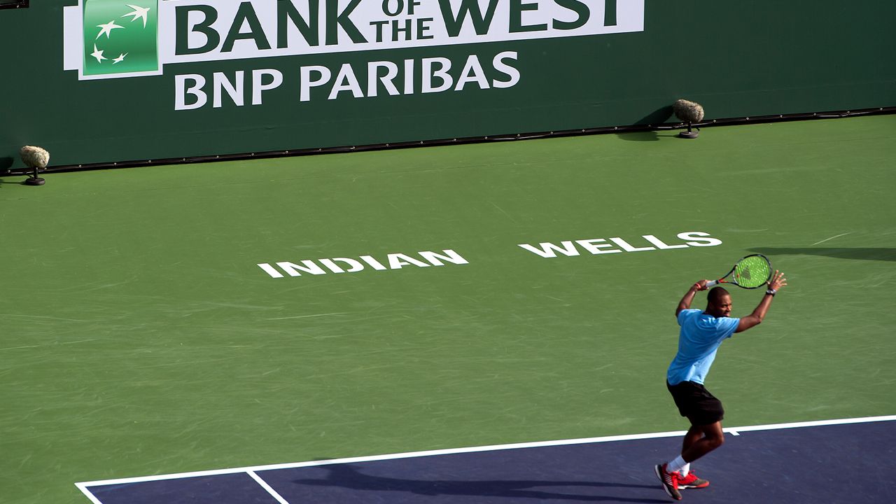 IMAGE DISTRIBUTED FOR BANK OF THE WEST - Donald Young warms up in front of the new Bank of the West logo during the BNP Paribas Open on Wednesday, March 15, 2017, in Indian Wells, Calif. (Rodrigo Pena/AP Images for Bank of the West)