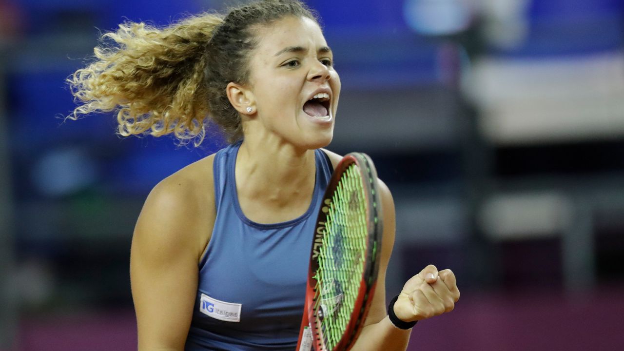 Jasmine Paolini of Italy reacts during the play-off round Fed Cup tennis match against Anastasia Pavlyuchenkova of Russia in Moscow, Russia, Saturday, April 20, 2019. (AP Photo/Pavel Golovkin)