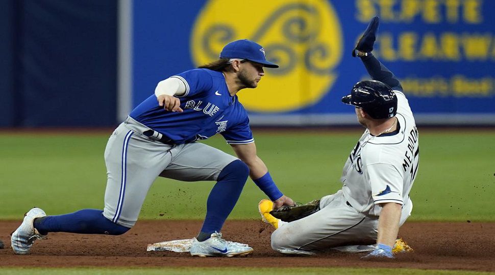 Kirk and Bichette push Blue Jays to brink of wild card berth with 11-4 win  over Rays
